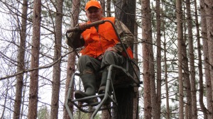 Seated in my ladder stand.